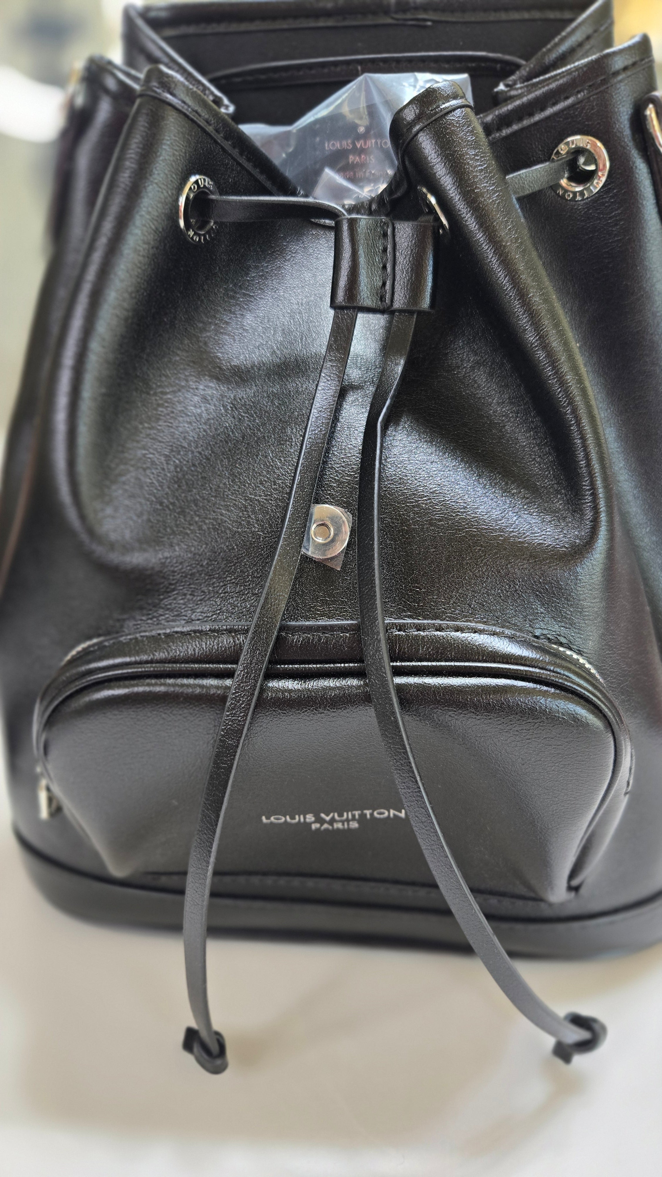 Small Genuine Leather Backpack with Monogram Accent
