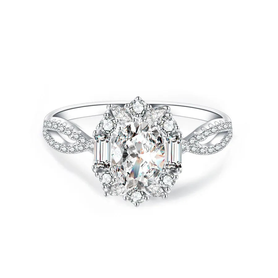 Diamond ring with a central gemstone and smaller diamonds on a white background