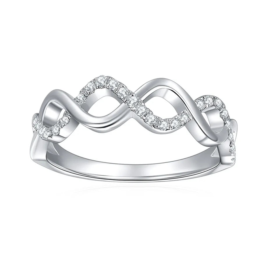 Silver ring with diamond accents on a white background