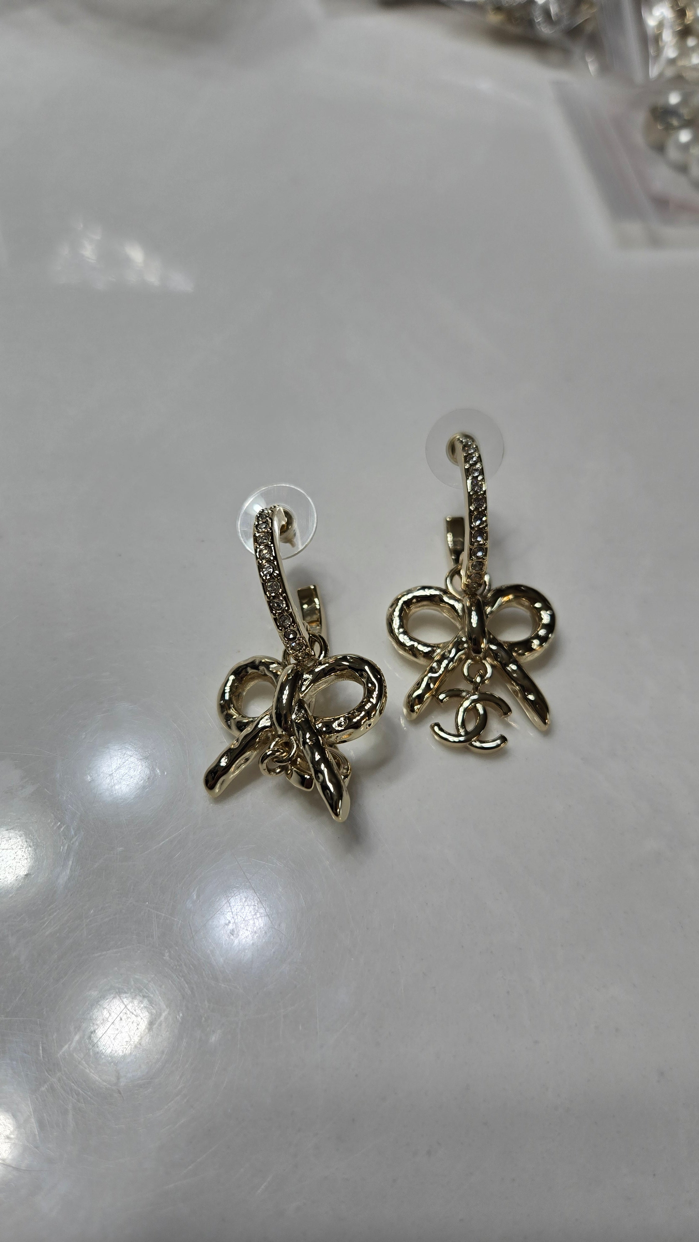 Elegant Gold Bow Drop Earrings with Crystal Accent