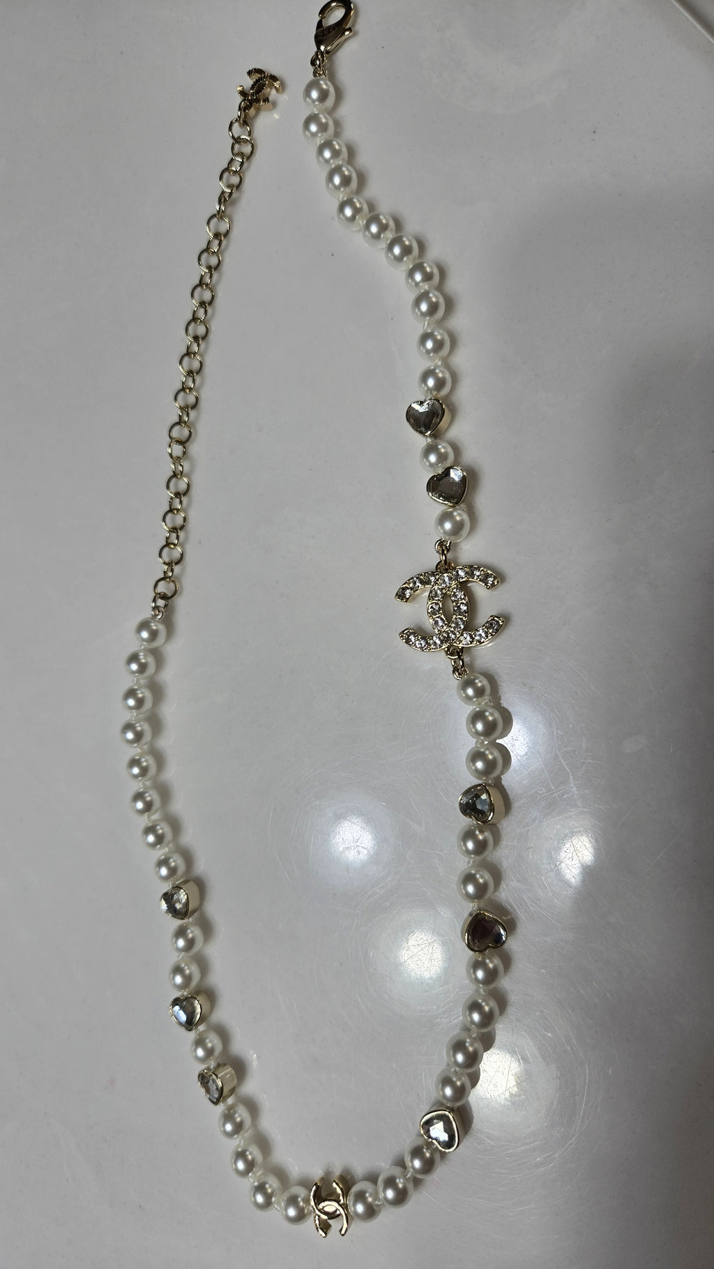 Elegant Pearl Necklace with Crystal Heart Accents – Silver Tone