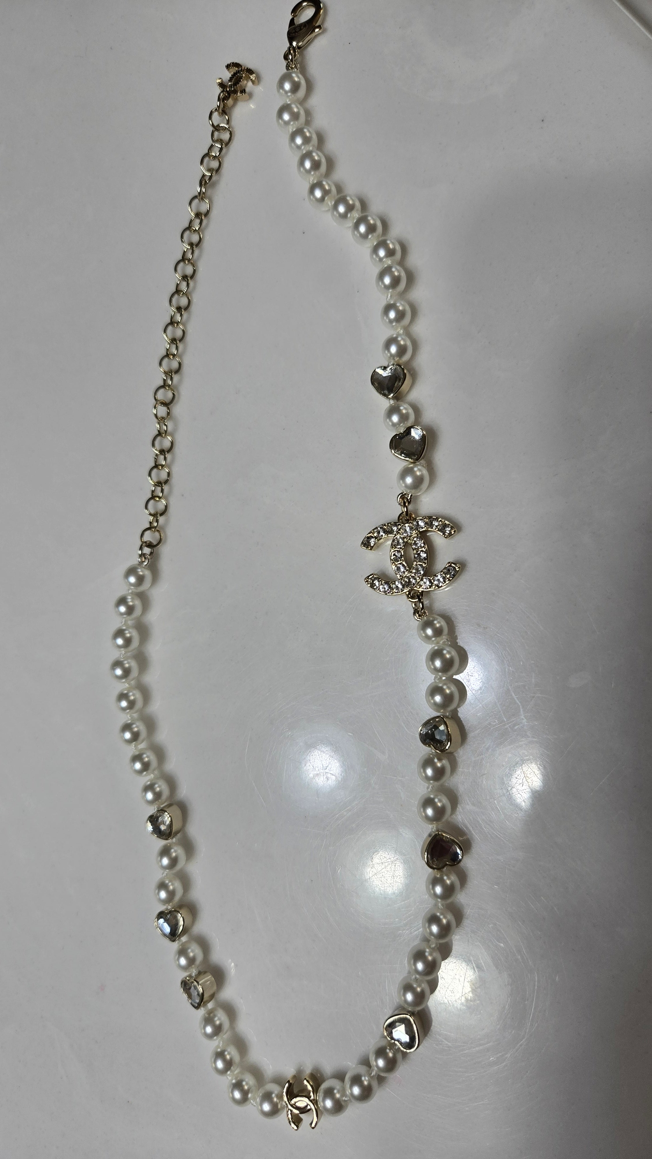 Elegant Pearl Necklace with Crystal Heart Accents – Silver Tone